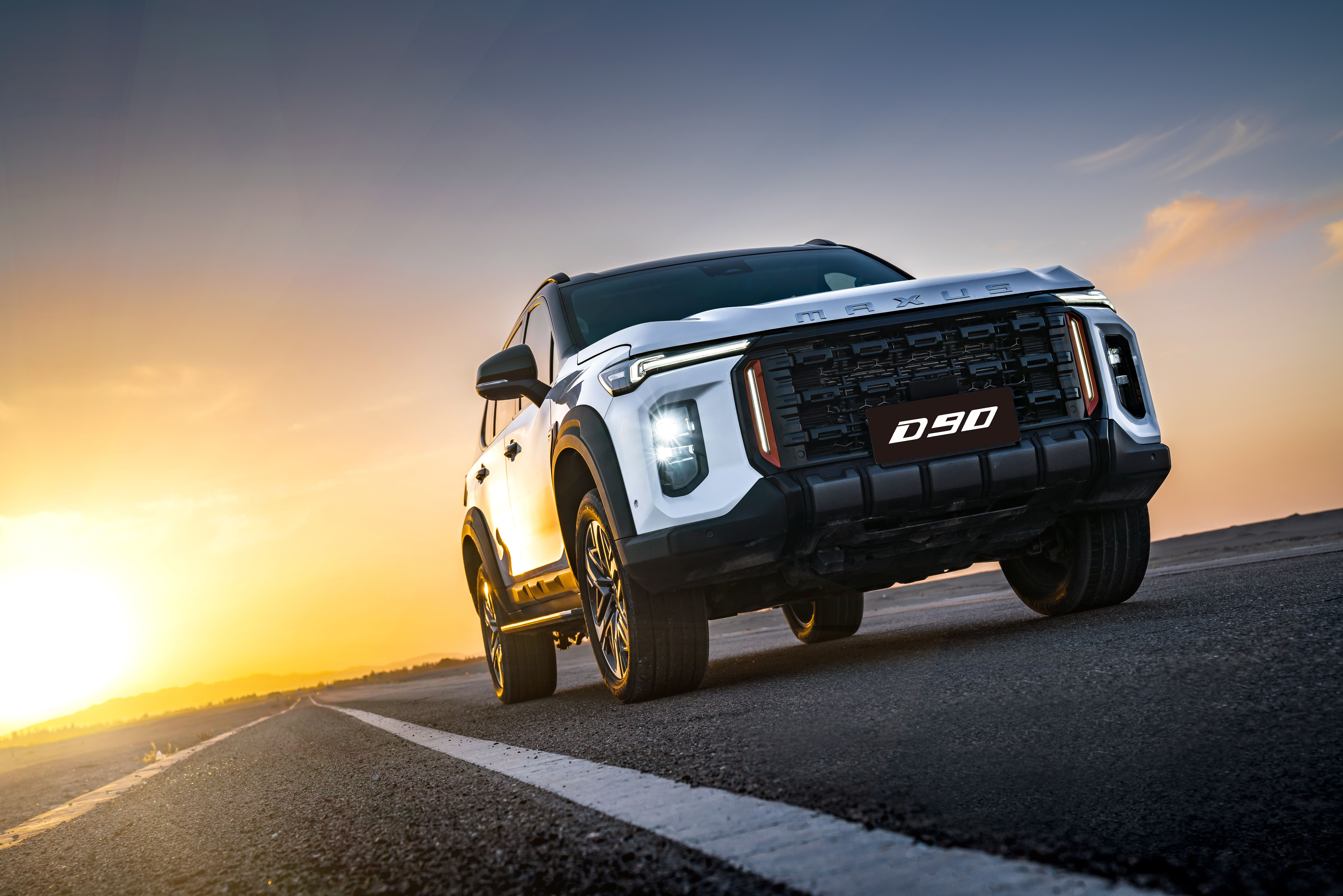 D90 front three-quarter white sunset