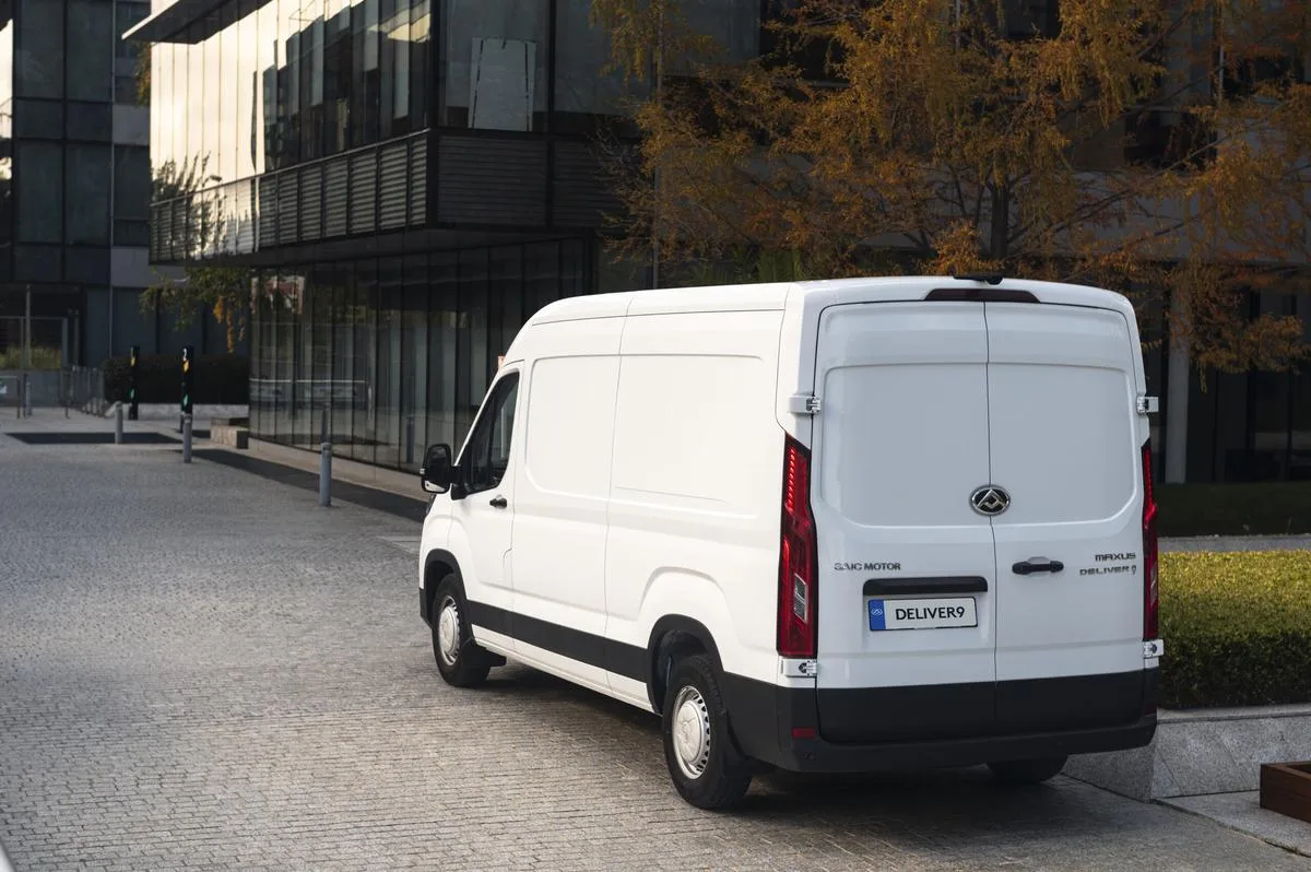 Deliver 9 rear three-quarter white building