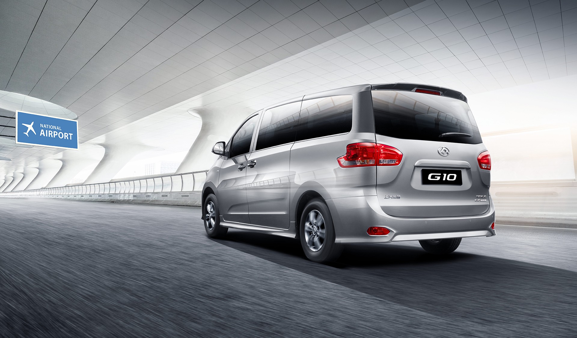 G10 rear three-quarter silver airport